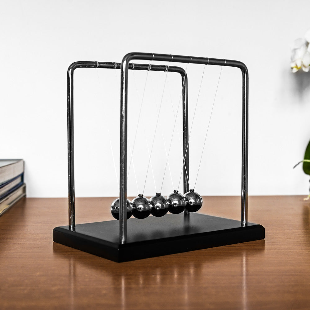 The Source Newton’s Cradle